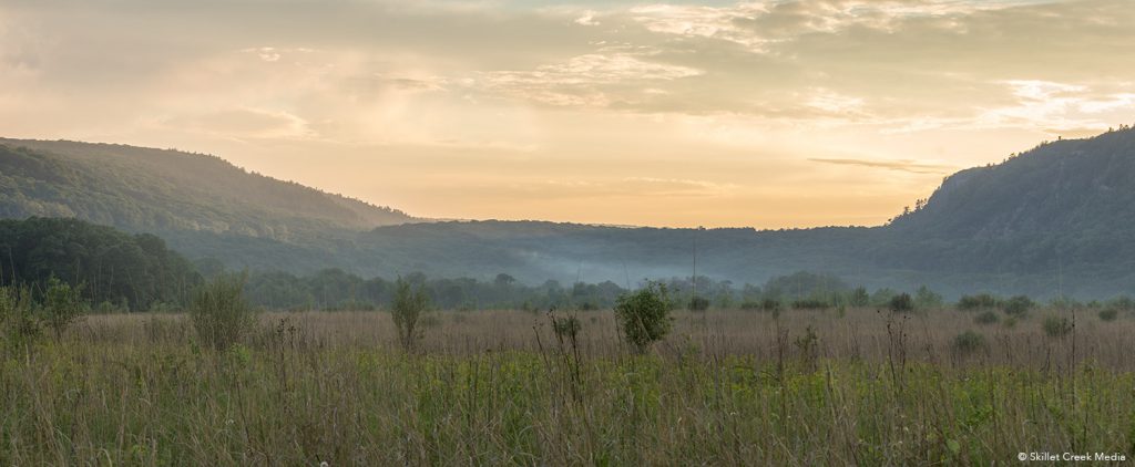 Between The South & East Bluff is a "dam" (Terminal Moraine) created during the Wisconsin Glaciation.