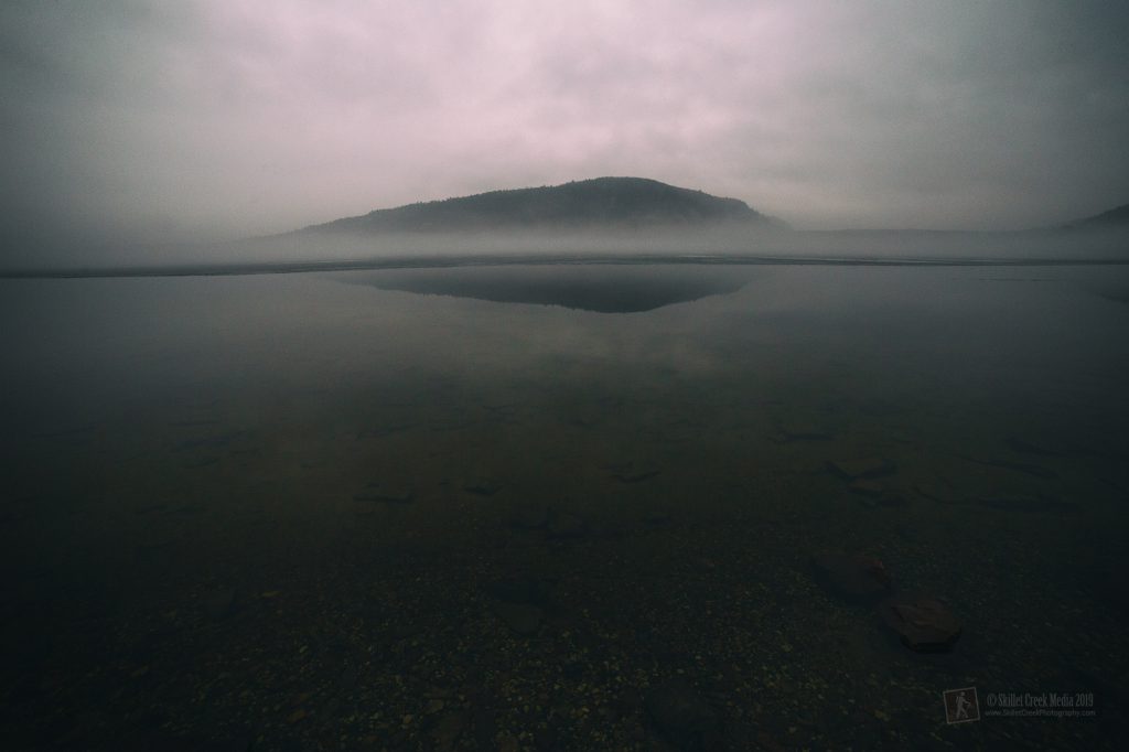 Morning fog over the ice at Devil's Lake.