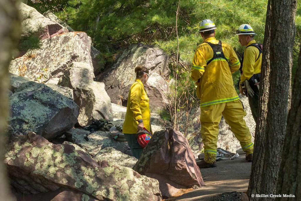 Crew monitors fire under the rocks in 2012.