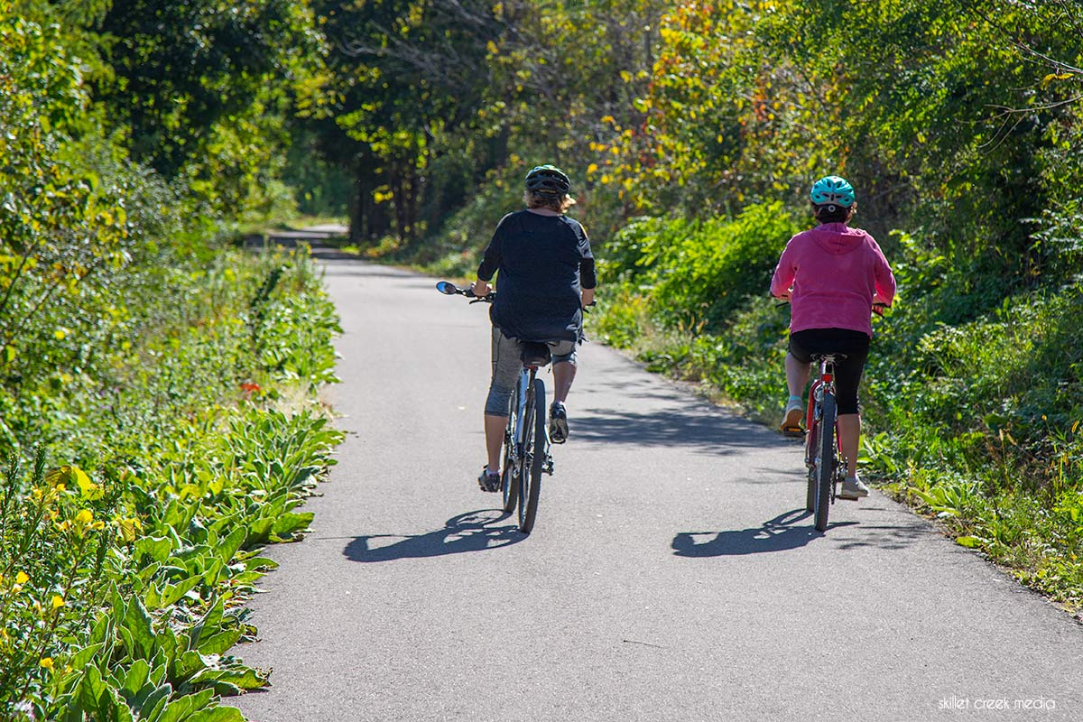 Women bike Great Sauk State Trail