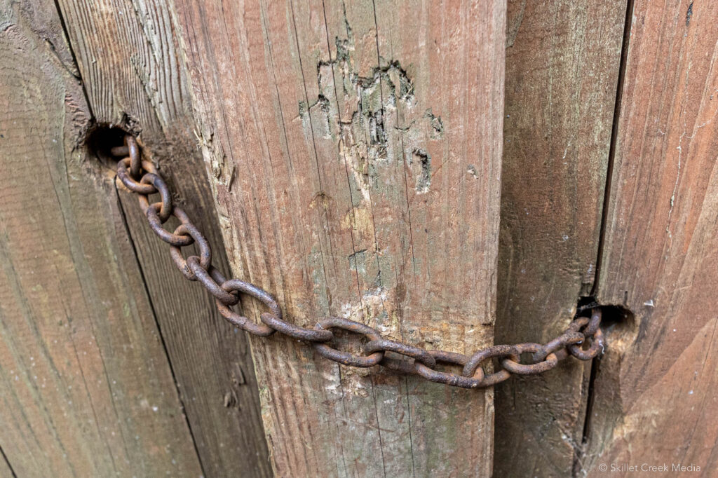 Chain on the locked Elroy Sparta Trail, Tunnel #1.